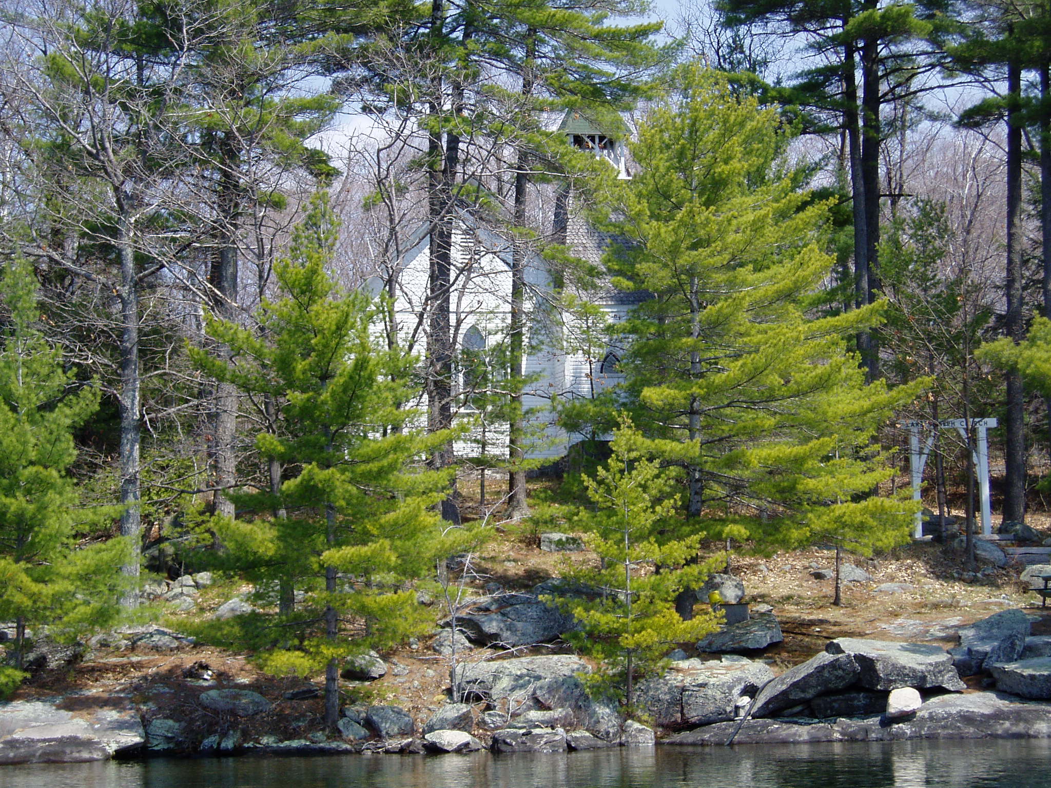 view of church building with trees in front