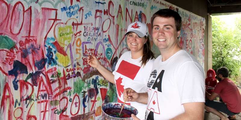 two people painting