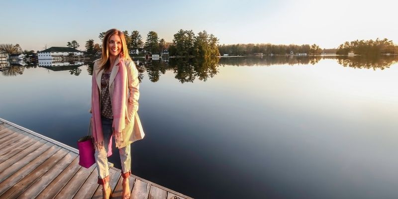 girl standing on dock