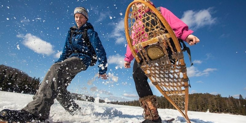 couple snowshoeing