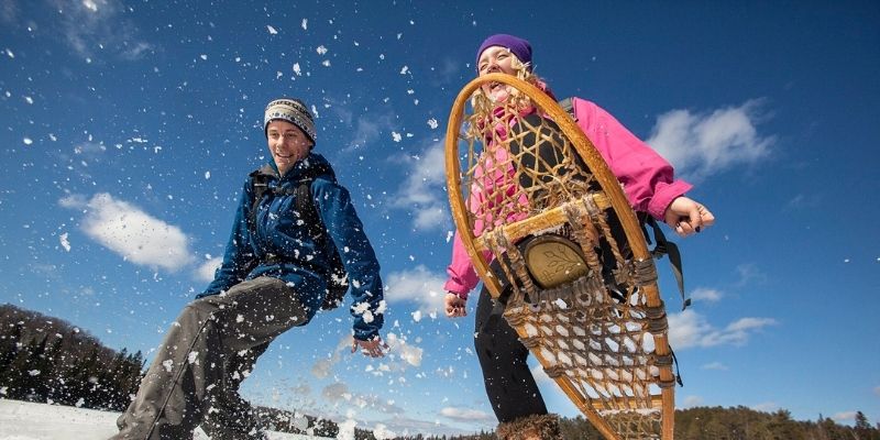 people snowshoeing