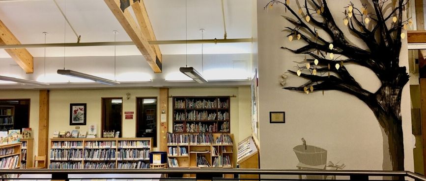 Giving Tree sculpture and quilt in the library in Port Carling