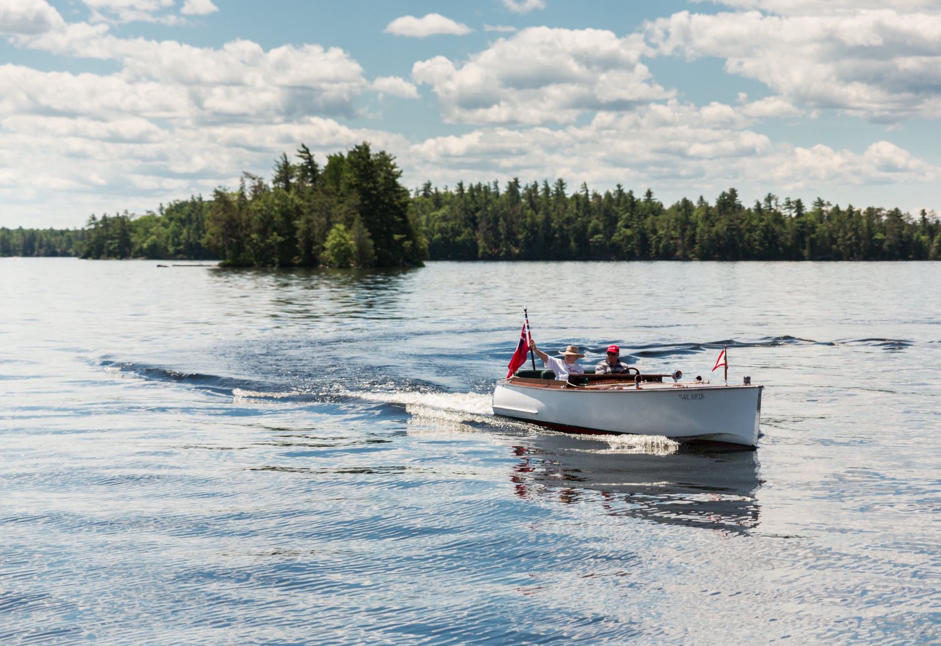 people boating on a lake