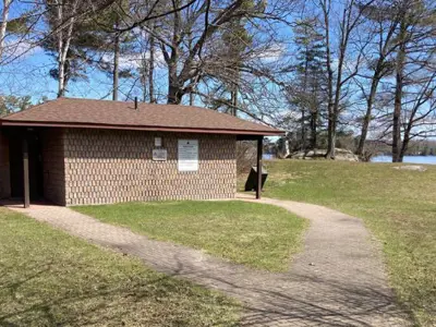 A Municipal building in a park by the water