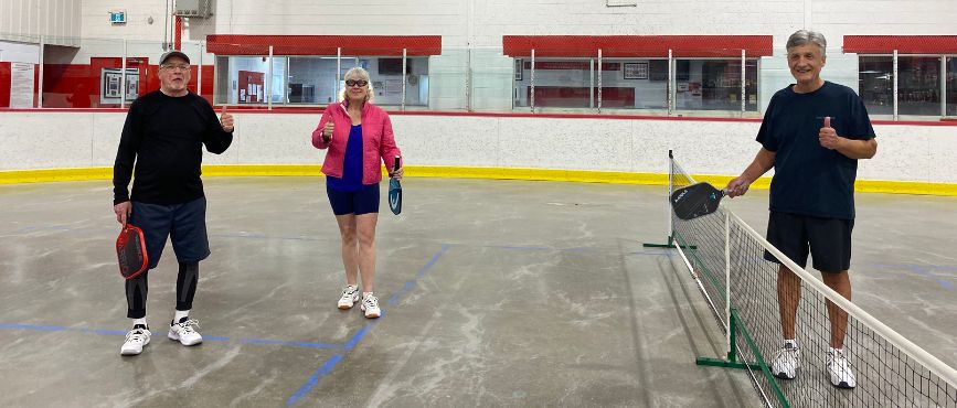 People on a Pickleball Court