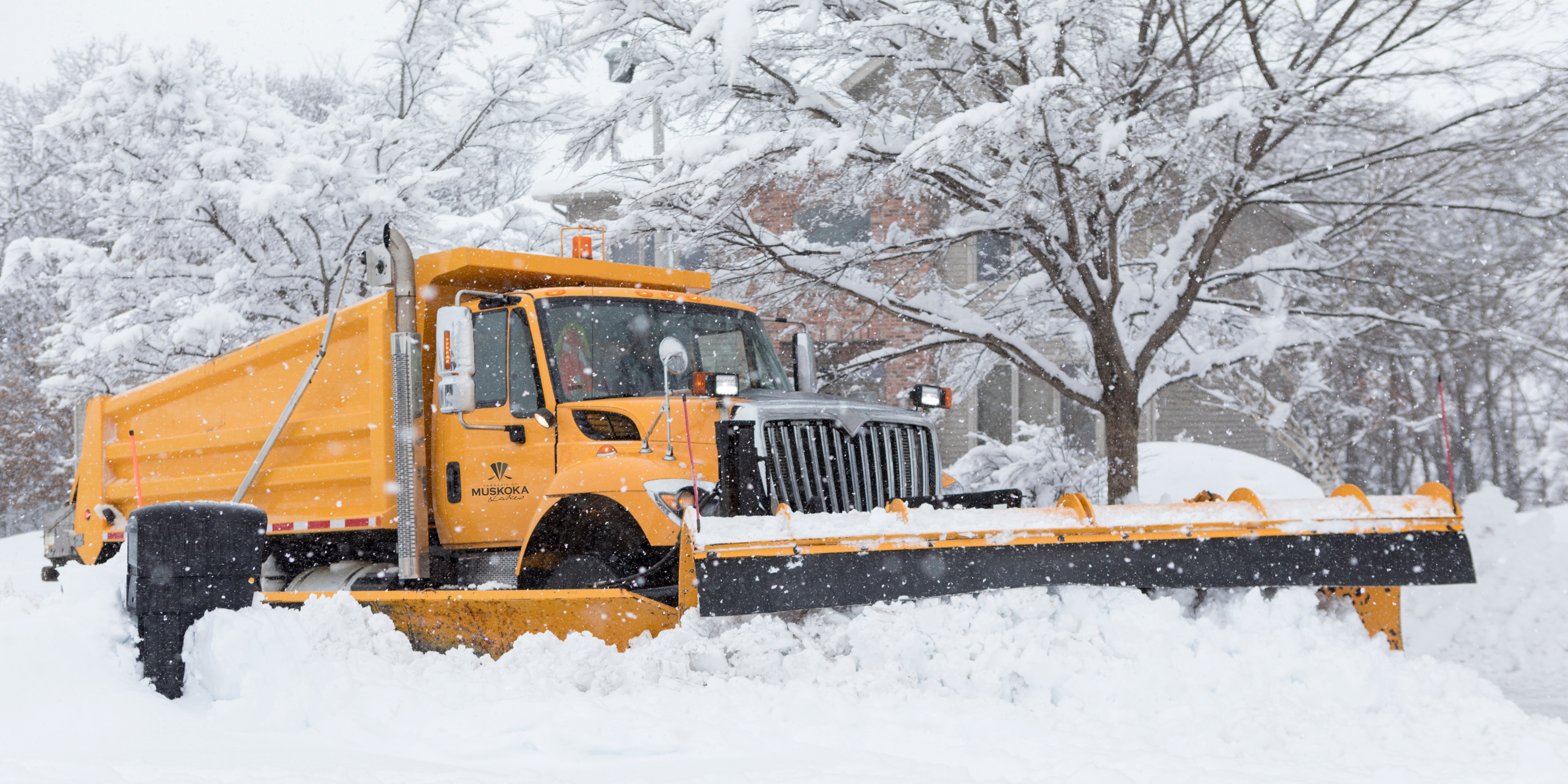 Snow plow in winter