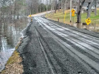 2019 Flooded land next to a road