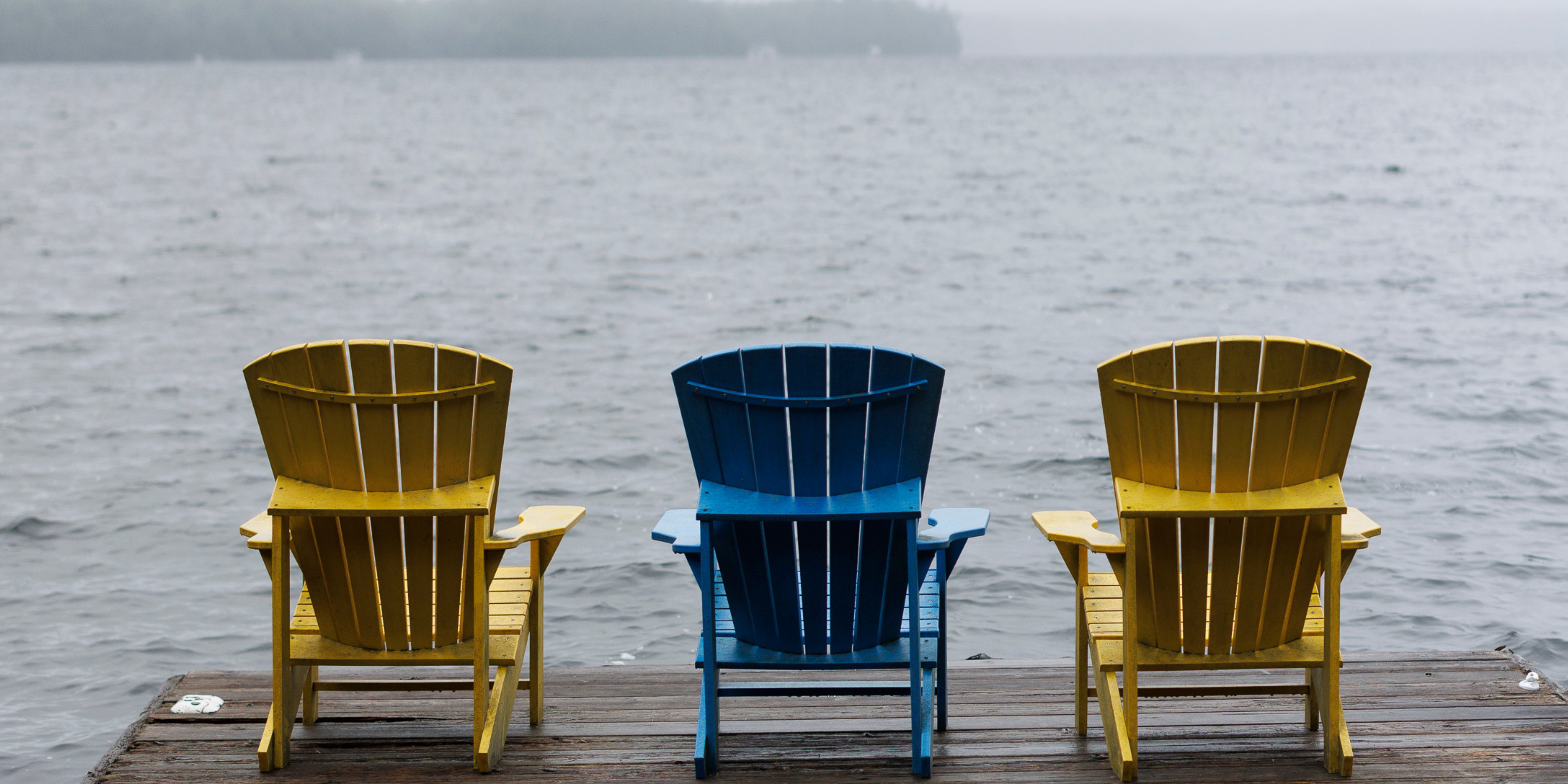 Muskoka chairs on dock