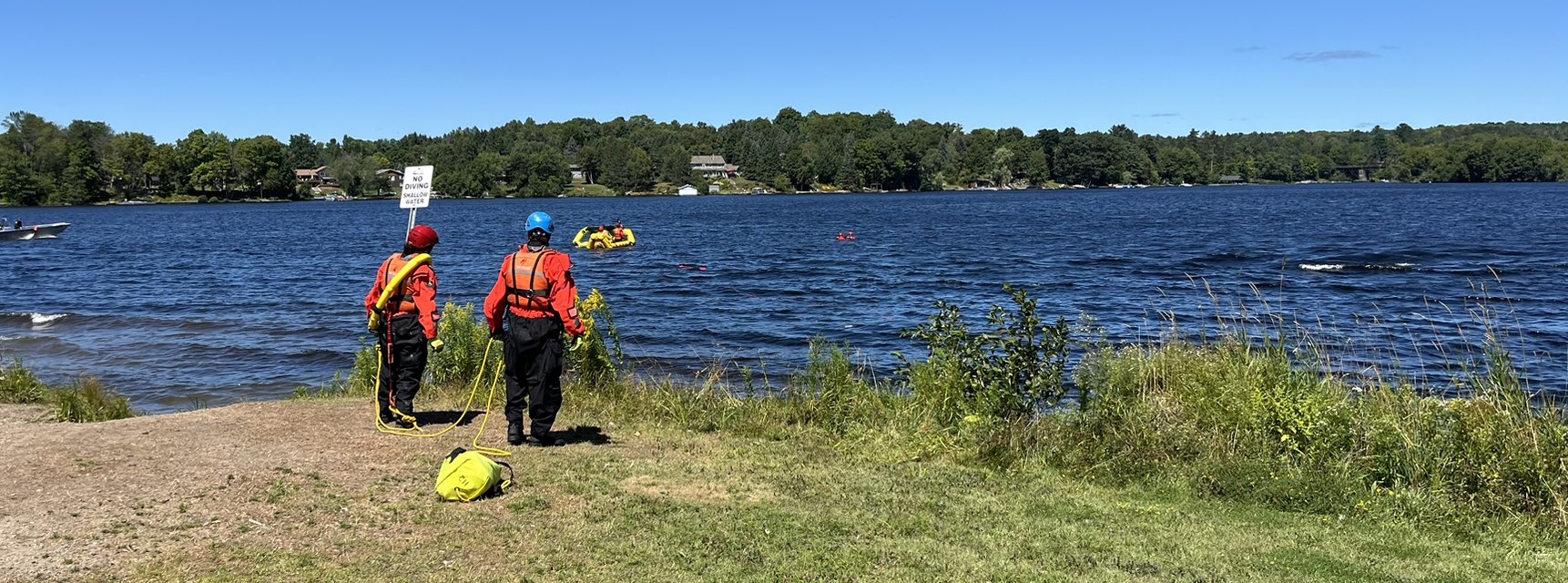 Rescue personnel looking out to the lake
